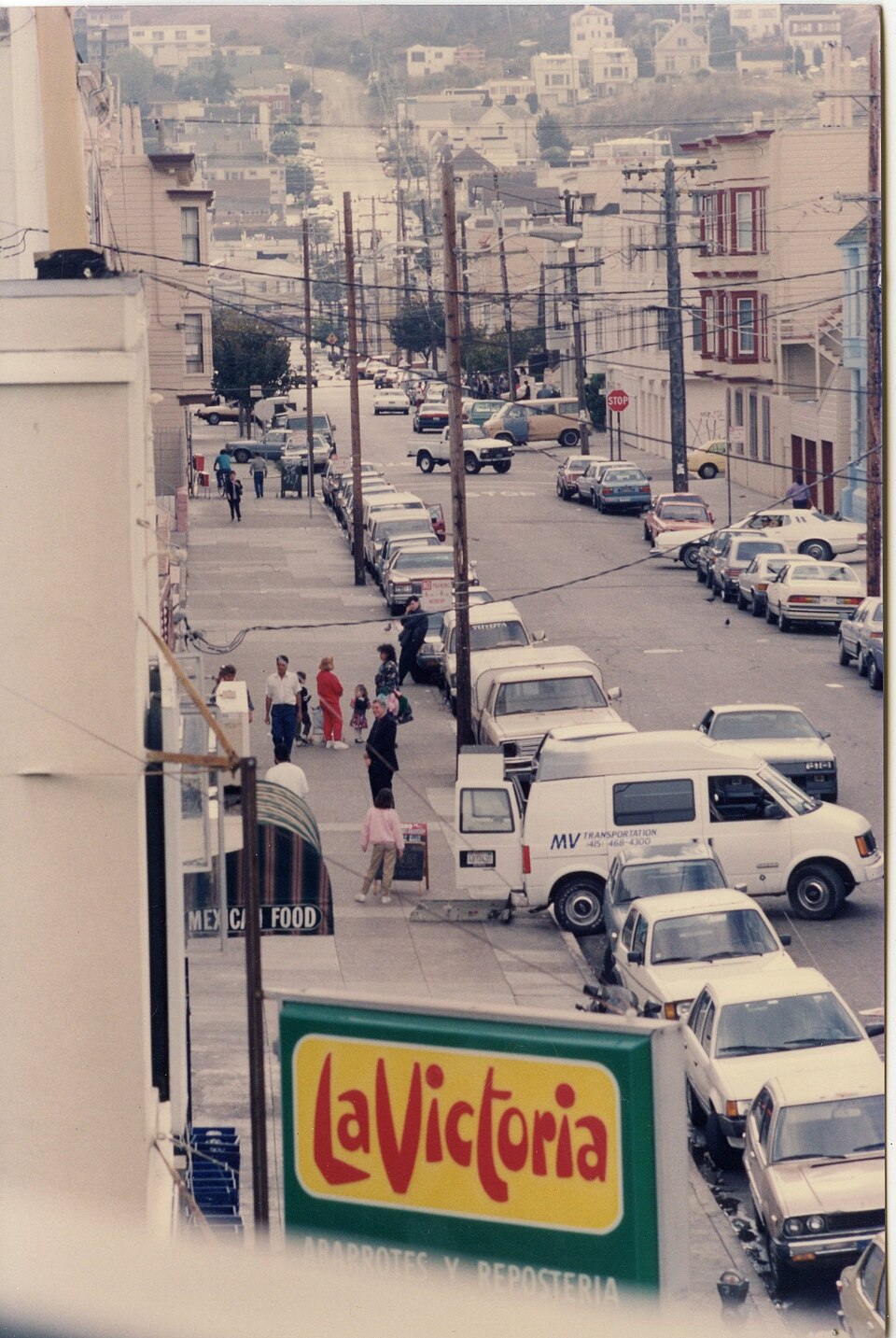 La Victoria sign above 24th Street and Alabama, viewed from above, with Mission streets descending into the distance in 1990.